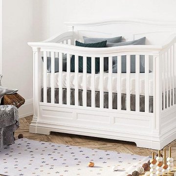 Side view of a crib in a kids room